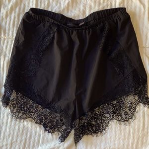 Black silk and lace shorts.